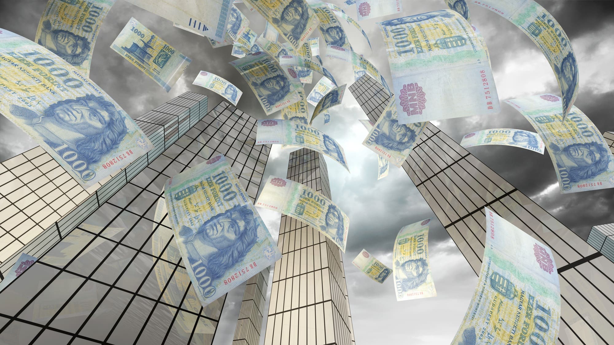 Magyar forint pénzeső magas irodaházak között